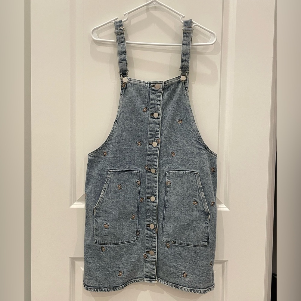 Overall denim dress with embroidered butterflies